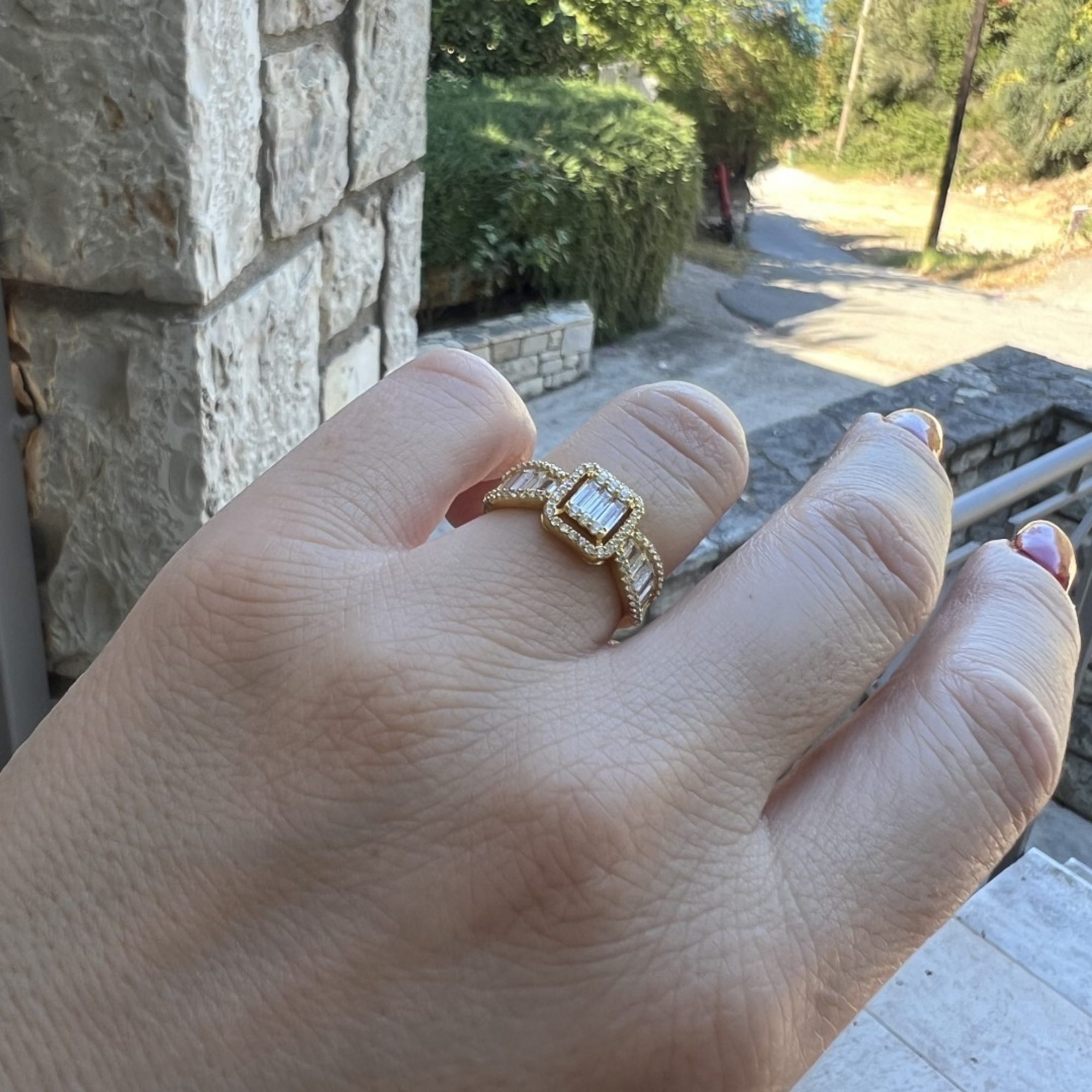 Gold plated ring with zircon stones